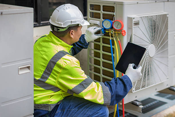 Professional Air Conditioning Repair technician working in Otisville, MI